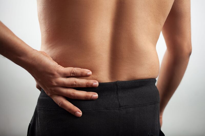 causas de dor no coccix